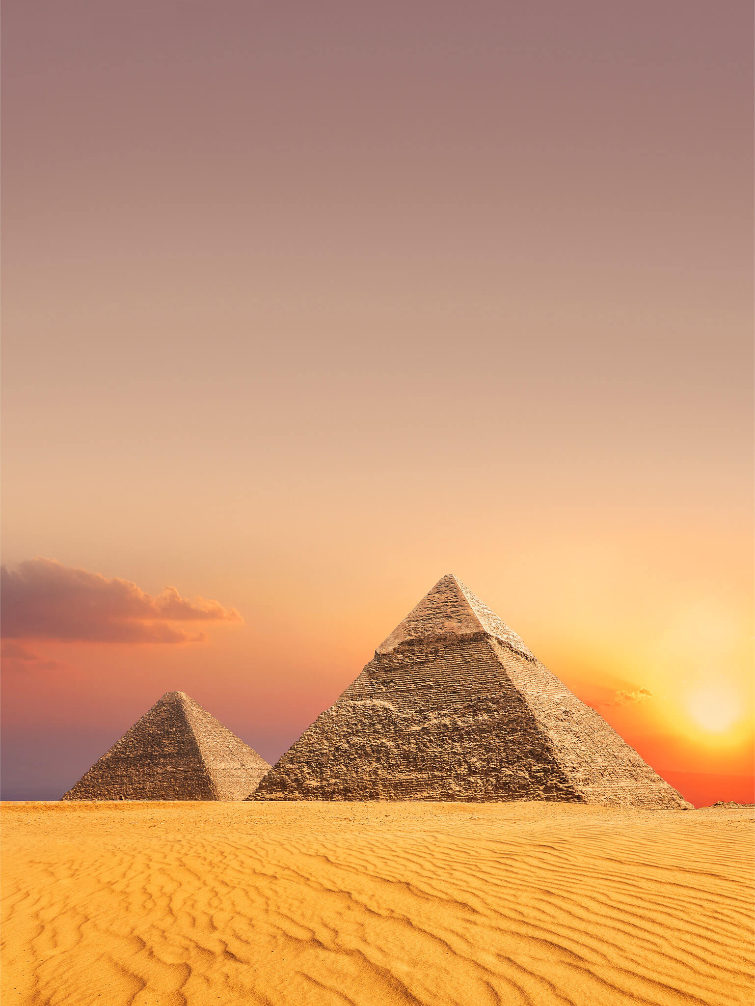 The pyramids of Giza at sunset